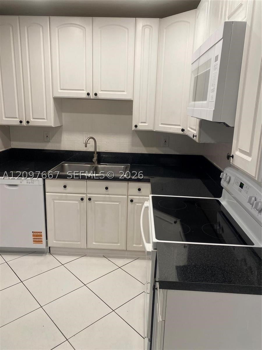 Photo of 6152 SW 2nd St, Margate, FL 33068 (MLS # A12097667)