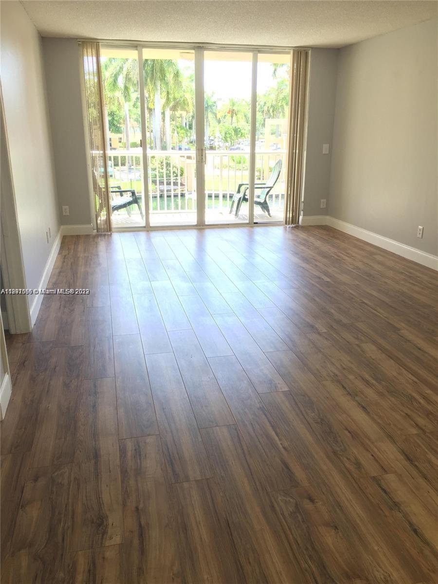 Walk to the beach! Recently renovated Beautiful floor plan with 2 bedrooms and 2 bathrooms. Large master bedroom with a huge walk-in closet. Tile in the bathrooms and wood floor throughout. Large patio/balcony. Full washer and dryer in unit. The association features a community pool, hot tub, and a small gym. The unit is on the 3rd floor with an elevator in the building. Sheridan East community is located by US1 and Sheridan St, within walking distance to Publix, Starbucks, restaurants, and shopping. Easy Access to US1, I95, and I595, 5 minutes to Ft. Lauderdale airport and Tri-Rail, 10 minutes to las olas blvd and downtown Ft. Lauderdale. 25 minutes to Miami Downtown. All ages and pets are welcome. Call now!
