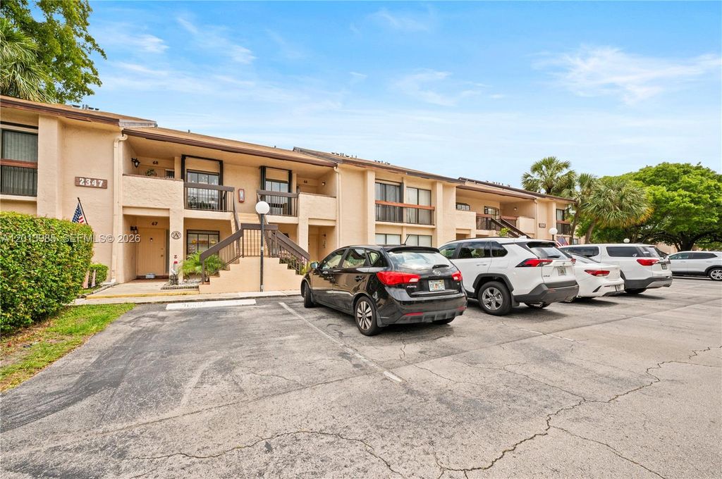 Photo of 2347 SW 15th St #66, Deerfield Beach, FL 33442 (MLS # A12013985)