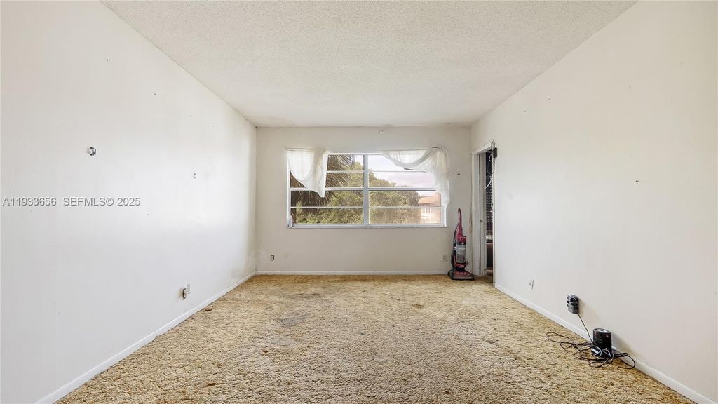 Photo of 5021 W Oakland Park Blvd #312, Lauderdale Lakes, FL 33313 (MLS # A11933656)