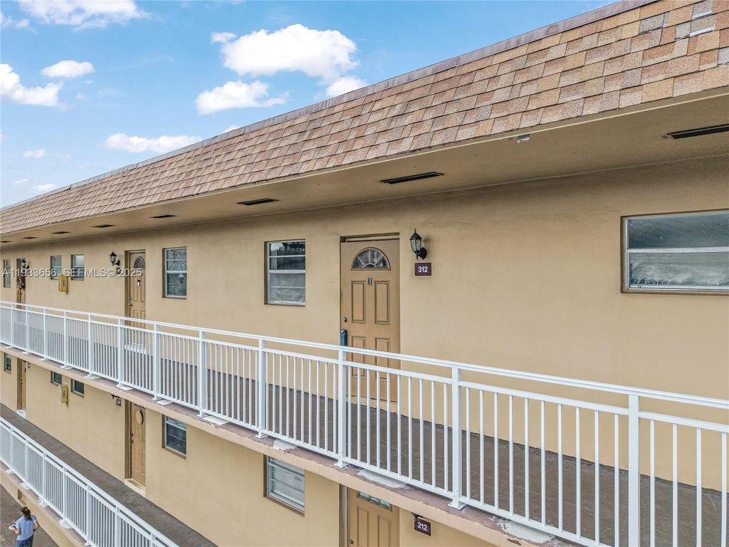 Photo of 5021 W Oakland Park Blvd #312, Lauderdale Lakes, FL 33313 (MLS # A11933656)