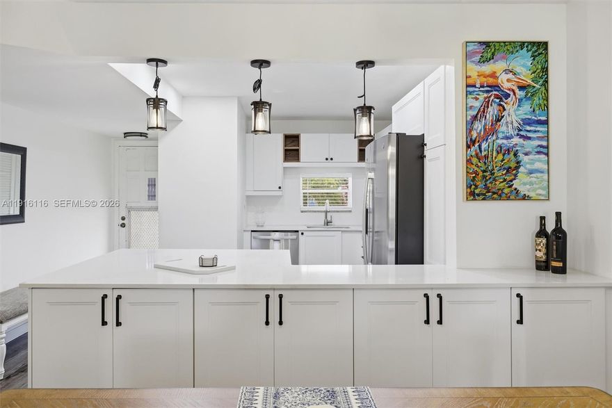 Renovated Condo in Golfer's Paradise Community -Play golf for free EVERYDAY!  Hollybrook Golf &Tennis, WITH two 18 holes PGA courses. This is a charming and tastefully renovated 2-bedroom, 2-bath condo located in the highly sought-after Hollybrook Golf & Tennis Club. This inviting first-floor residence features a beautifully updated kitchen with luxury finishes, perfect for both cooking and entertaining. This unit has 4 parking spots one just in front of unit.  Enjoy golf views from your private patio, creating a peaceful retreat after a day of activities. Hollybrook is an exceptional community for golfers of all levels, pickleball players, and tennis enthusiasts. The clubhouse features a full-service restaurant, gym, adding convenience and enjoyment to your lifestyle. Move-in ready and full of charm, this condo offers comfort, style, and resort-like living.