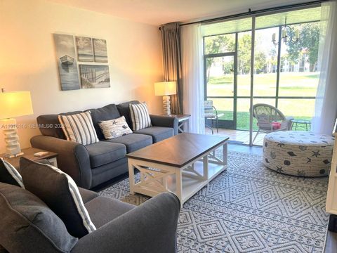 Photo of 8941 S Hollybrook Blvd #103, Pembroke Pines, FL 33025 (MLS # A11916116)