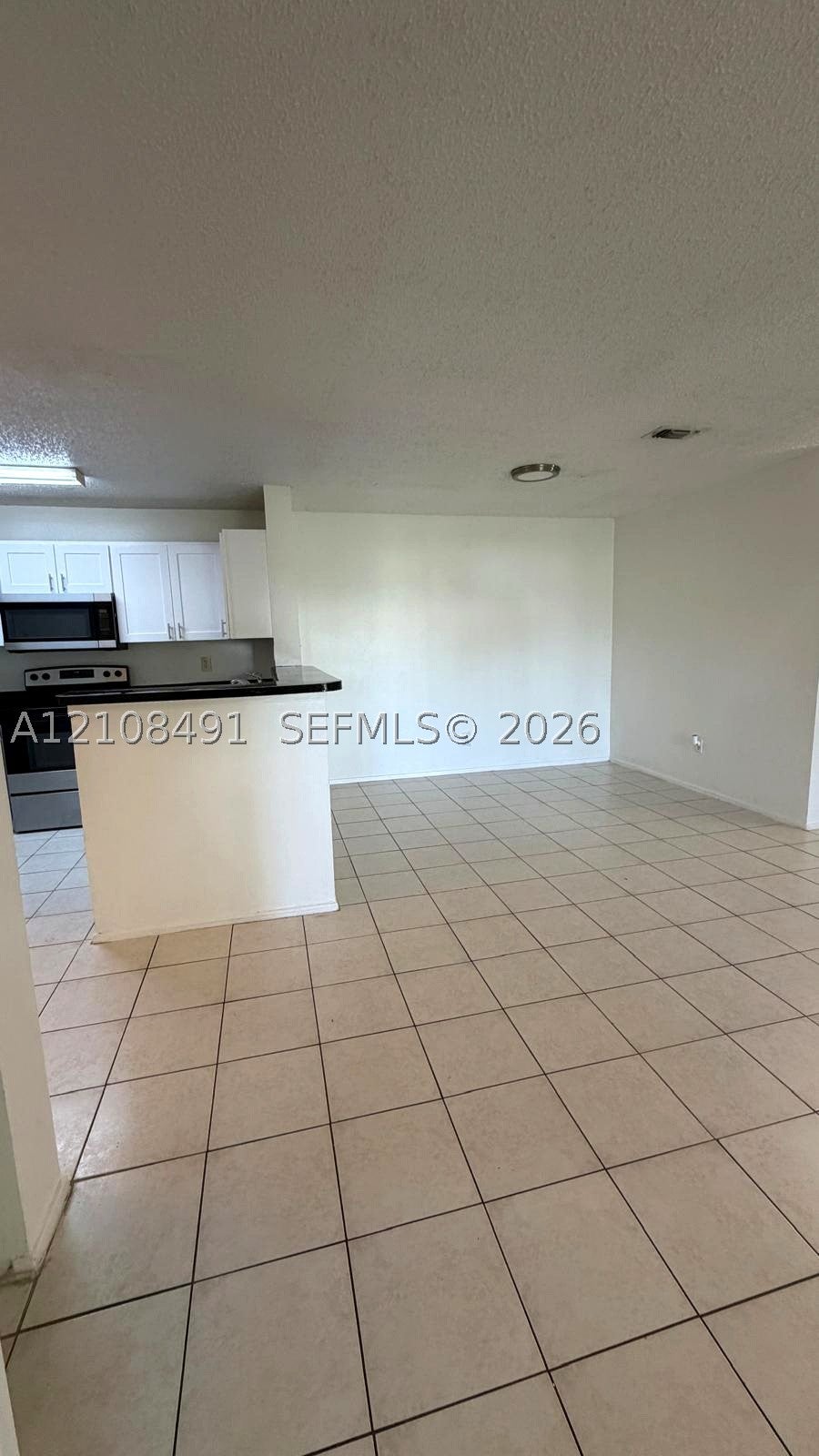 Photo of 11233 W Atlantic Blvd #103, Coral Springs, FL 33071 (MLS # A12108491)