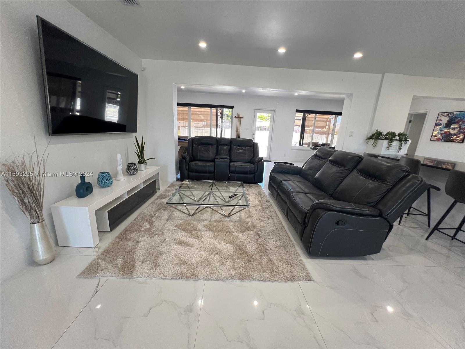 Welcome to this stunning home in East Hallandale Beach! Situated on a MASSIVE corner LOT of just under 15,000 square feet, This completely renovated 5-bedroom residence offers just under 3000 square feet of interior space. Step inside to discover a beautifully updated interior, featuring two new A/C units. The kitchen boasts modern appliances and plenty of counter space, making meal preparation a breeze. Outside, you'll find a brand new pool, offering the ideal spot to relax and soak up the sunshine. Centrally located, you'll find yourself just moments away from the beach, dining, shopping. Amazing Air Bnb property!