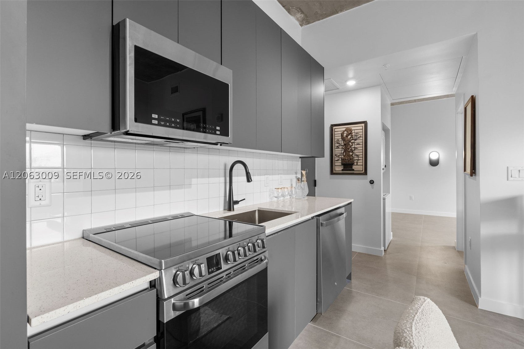 315 NW 32 ST 303