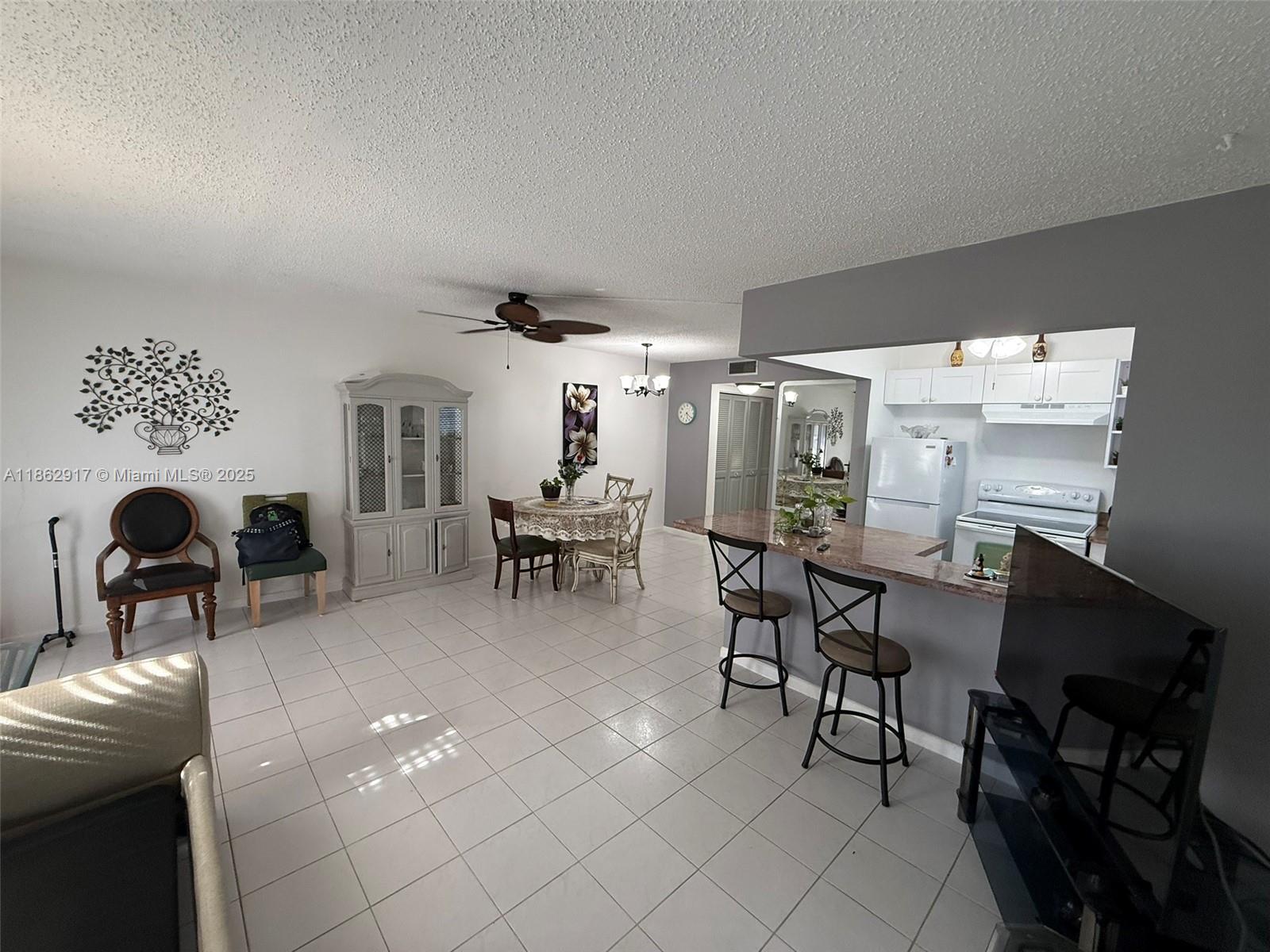Remodeled 1 bed, 1.5 bath condo in Century Village, Deerfield Beach. Features open kitchen with granite counters, in-unit washer/dryer, and ceramic floors throughout. Move-in ready and best priced in the community!