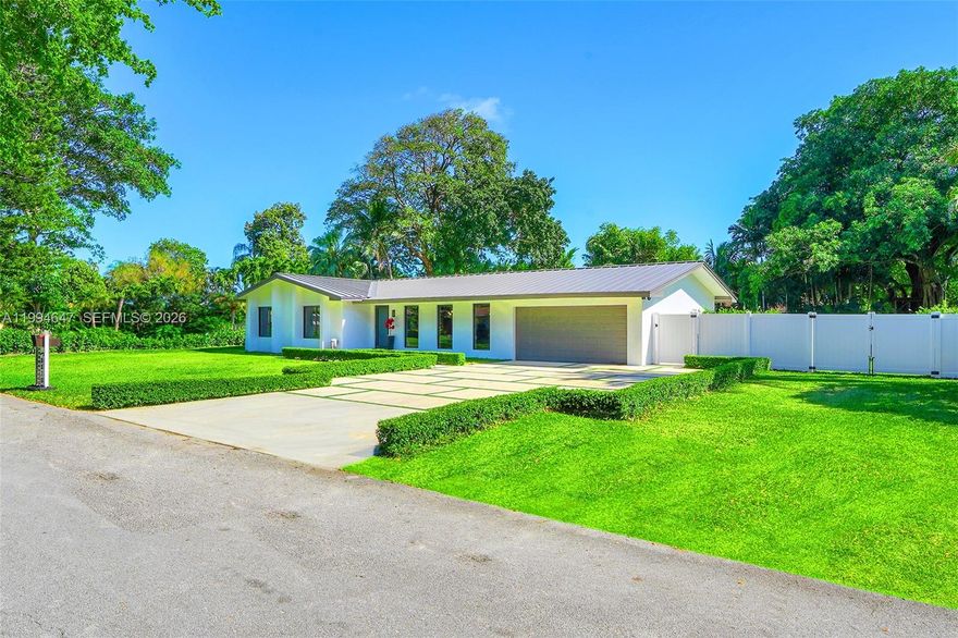 This is the one. Fully rebuilt 5BD/3BA on a rare estate-sized lot in Palmetto Bay. 2,696 SF, NO HOA, heated saltwater pool, and room for a pickleball court. New everything: electrical, plumbing, metal roof, 2 A/C units, water heater, concrete. All permitted. Zero deferred maintenance.
The kitchen will sell this home. A one-of-a-kind oversized island with built-in storage, integrated wine cooler & massive quartz countertop. Full suite of LG Smart appliances, modern cabinetry & open-concept flow into living and dining. You have to see this island in person.
Electric blinds on every window. Complete impact windows & doors. Porcelain tile throughout. Split-bedroom floorplan with two master suites, each with renovated en-suite baths & walk-in showers. New drywall, doors & designer light fixtures. Nothing left untouched.
The backyard is your private retreat: saltwater pool with heater, grass-paver accents & mature tropical landscaping. Oversized A/C 2-car garage with Tesla EV charger. Extended driveway for guests.
Minutes from Westminster Christian & Palmer Trinity. Near Old Cutler Rd & Deering Estate. Schedule your private showing before someone else does.
