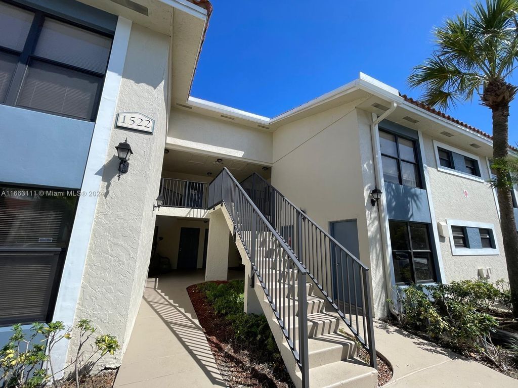 Photo of 1522 Lake Crystal Dr #H, West Palm Beach, FL 33411 (MLS # A11663111)