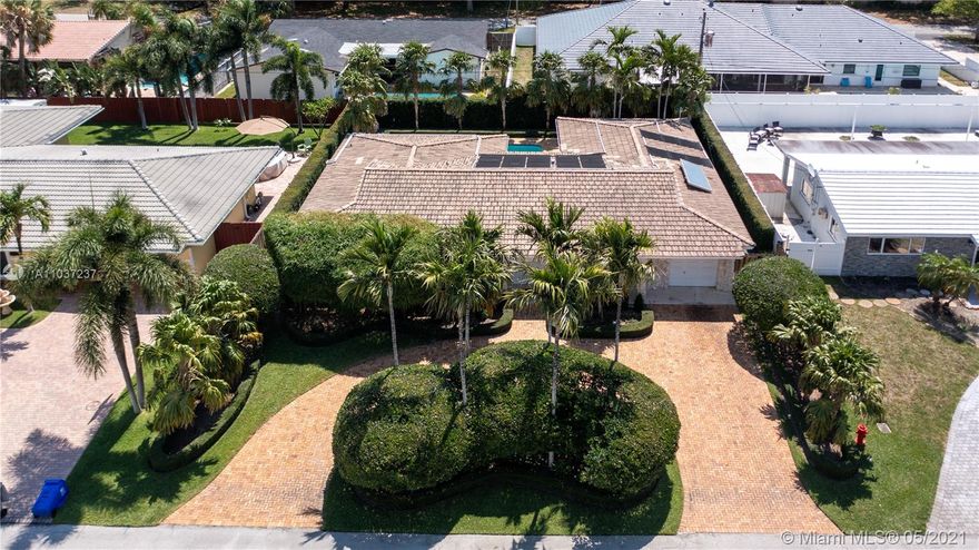 Beautifully Landscaped True 4 Bed 3 and one half Bathroom Pool home located in Coral Park Addition. Large great room with endless possibilities. Complete with Impact doors and windows and even an Impact garage door too. Beautiful backyard with two porches to enjoy the Pristine pool and landscaping. Home also has two zones of Air Conditioning, automatic sprinklers too.  Crown molding throughout. Home last updated in 2000 and awaits your touches or simply enjoy as-is. Home being offered AS-IS.
                                                     ****NO SIGN ON PROPERTY****