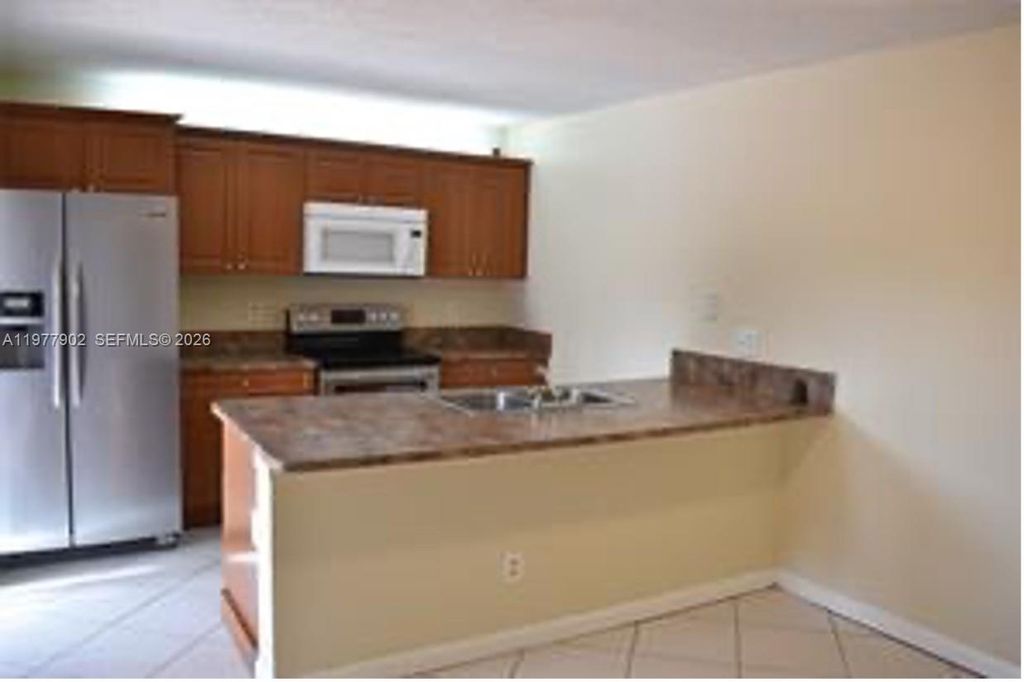 Photo of 8392 S Coral Cir #8392, North Lauderdale, FL 33068 (MLS # A11977902)