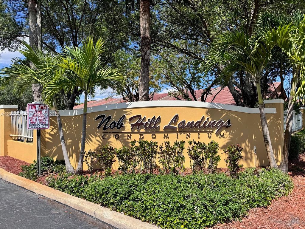 Photo of 9909 Westwood Dr #16-1, Tamarac, FL 33321 (MLS # A12013790)