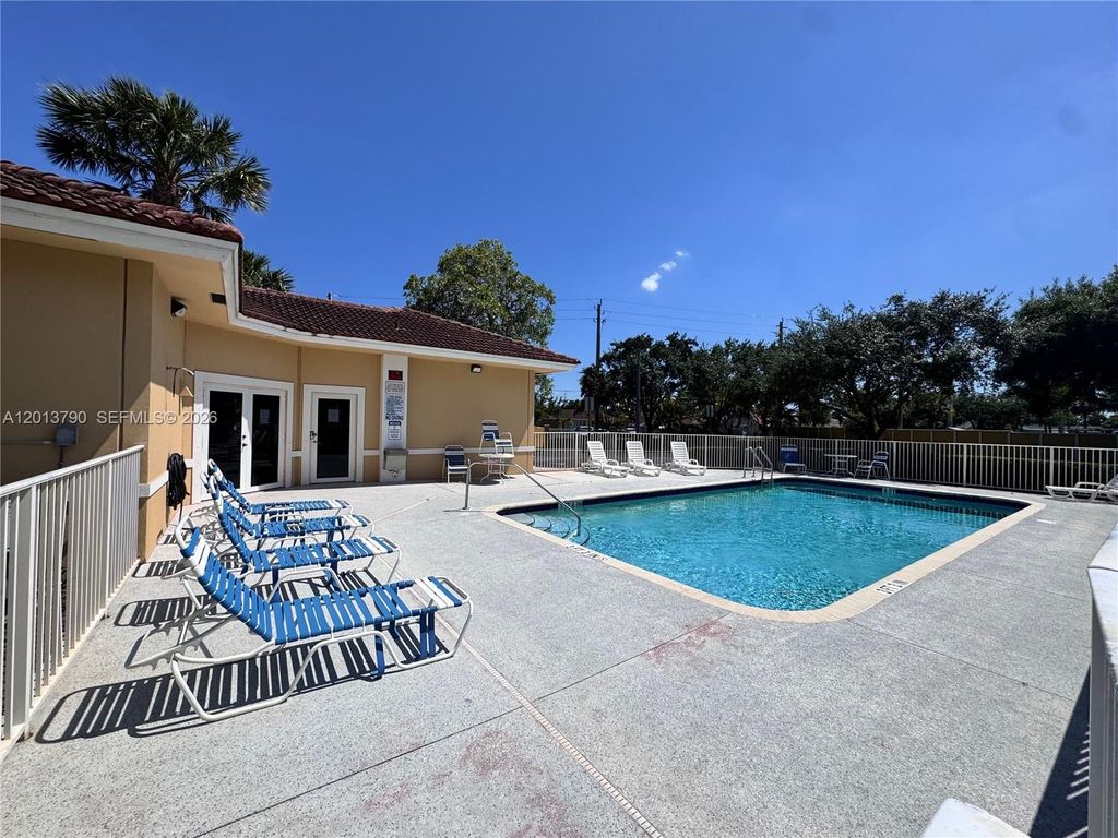 Photo of 9909 Westwood Dr #16-1, Tamarac, FL 33321 (MLS # A12013790)