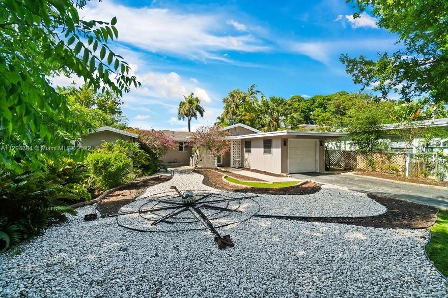 Beautifully renovated two bedroom two bathroom water home WITH 55 FEET OF WATER VIEW. This home is set back on a wide quiet part of the north fork of the middle river that offer OCEAN ACCESS. CBS CONSTRUCTION,Hurricane impact windows, newer roof, screened in patio, stainless steel appliances, beautiful high end countertops, garage, central AC, boat davits and a quiet space to enjoy an uninterrupted view of the stunning back yard and its water views. Centrally located to wilton drive, beaches dining  hospitals and Las Olas.
This property is one of a kind.