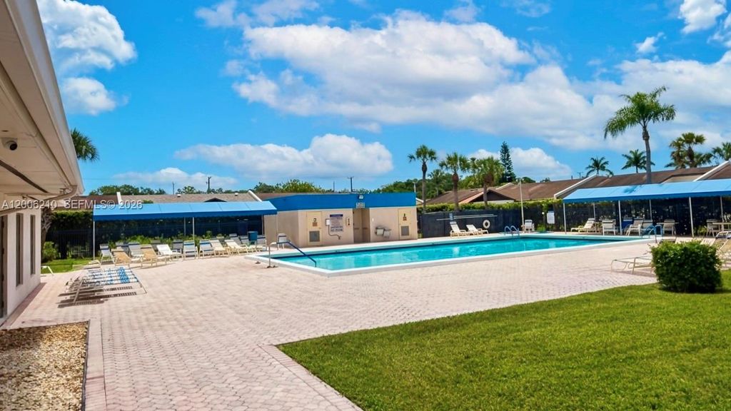 Photo of 5190 Las Verdes Cir #115, Delray Beach, FL 33484 (MLS # A12006210)
