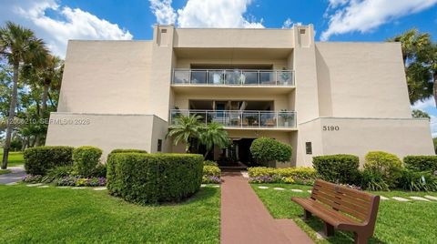 Photo of 5190 Las Verdes Cir #115, Delray Beach, FL 33484 (MLS # A12006210)