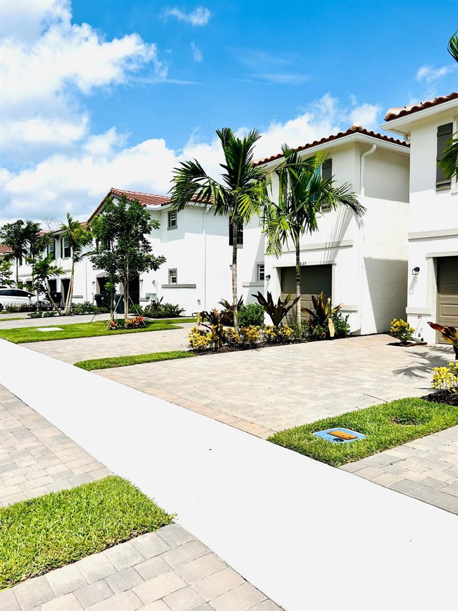 This 2023 new construction two-story home features a modern open-concept layout that connects the kitchen, dining, and family room, plus an attached patio and enclosed outdoor storage room for added versatility. All bedrooms are upstairs, including a spacious owner’s suite with a private bathroom for enhanced comfort and privacy. Enjoy access to the nearby community pool—perfect for relaxation and unwinding after a busy day. The home has been thoughtfully upgraded with modern light fixtures and tasteful enhancements throughout. Located in a welcoming neighborhood with convenient access to shopping and dining. Photos with furniture are for illustration only. Don’t miss the opportunity to make this beautifully designed home yours.