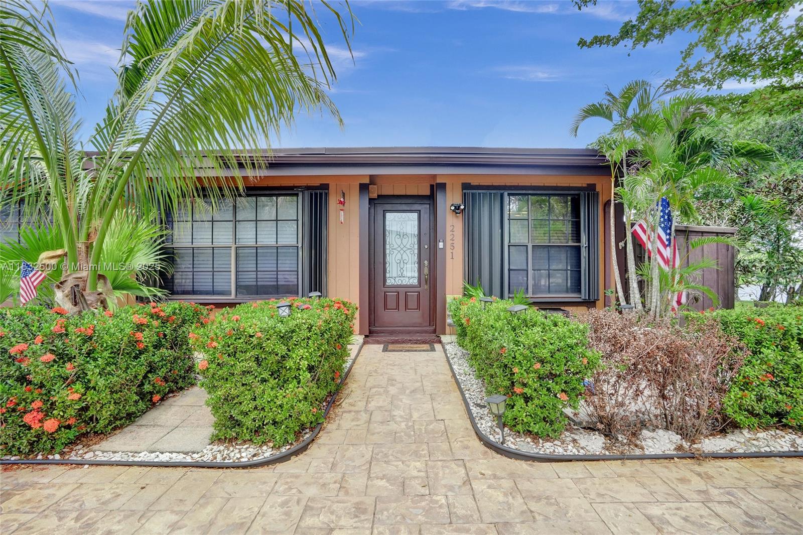 Lovely 2/2 corner Cedarwoods villa with a loft located on the lake in an adorable community in the heart of Pembroke Lakes. Open and airy unit has wood vaulted ceilings, eat in kitchen, an open patio overlooking a beautiful lake plus a large storage shed on the west side of the villa. Plenty of cabinetry in the eat in kitchen overlooking the dining and living room. Large walk in closets in both bedrooms. The loft area can be used as an office, play area or even a hobby room. Beautiful lush landscaping in the backyard. Enjoy the constant breezes from the patio. Lots of windows for great natural lighting throughout. Located on a dead end street with 2 parking spots plus guest parking across from the unit. Great biking/walking path and child play areas. Low maintenance!