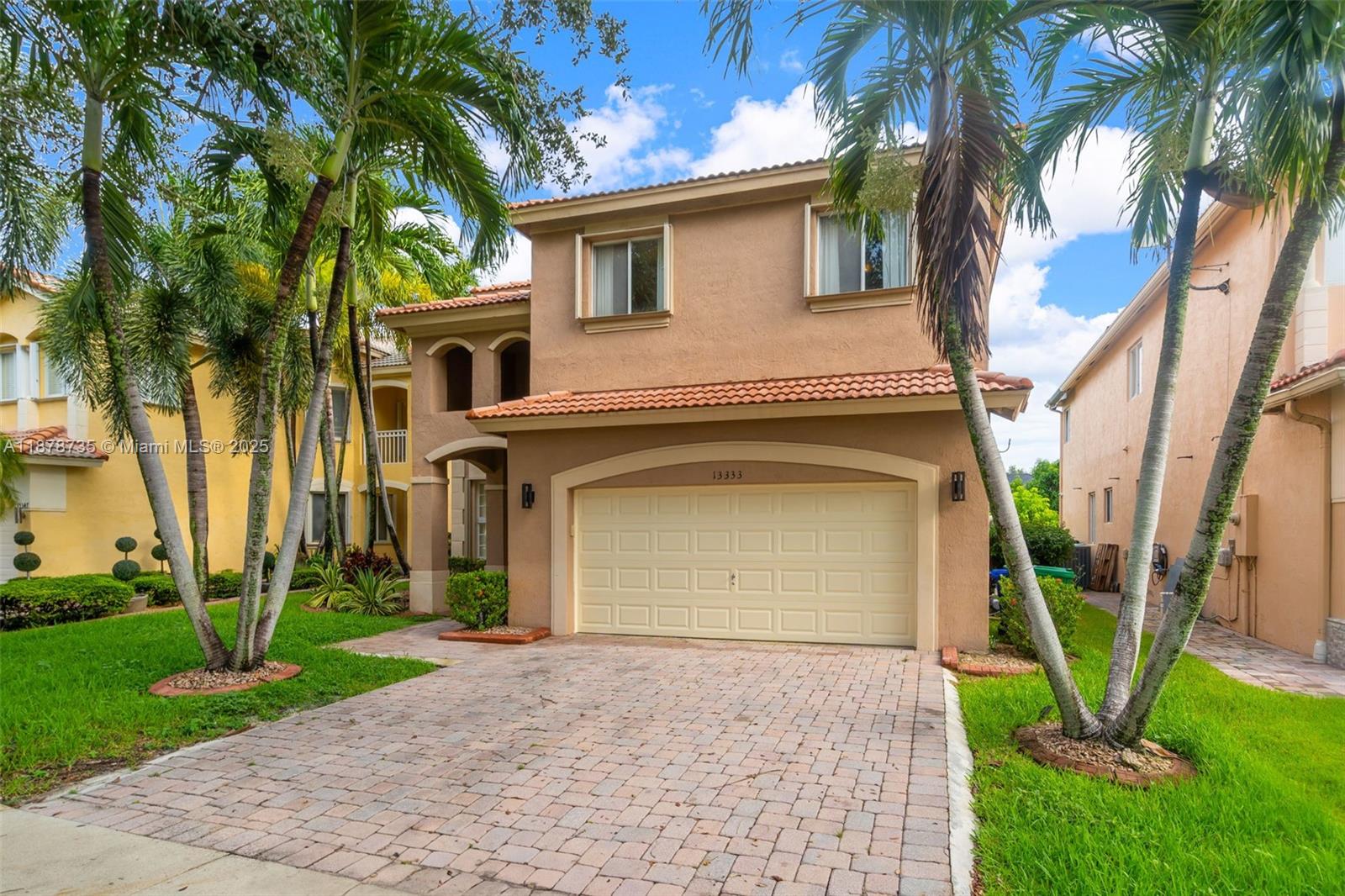 Welcome to this spacious two-story home in the desirable Portofino South community. Filled with abundant natural light, the residence features wood and tile floors throughout for a modern, inviting look. Upstairs, you'll find four well-sized bedrooms, all recently painted and deep cleaned for a fresh, move-in ready feel. The layout offers privacy and comfort for families, with all bedrooms located on the second level. Step outside to enjoy the home's excellent entertainment area, perfect for gatherings or relaxation, with serene lake views enhancing the setting. Combining comfort, functionality, and style, this property is ready to welcome its next residents.