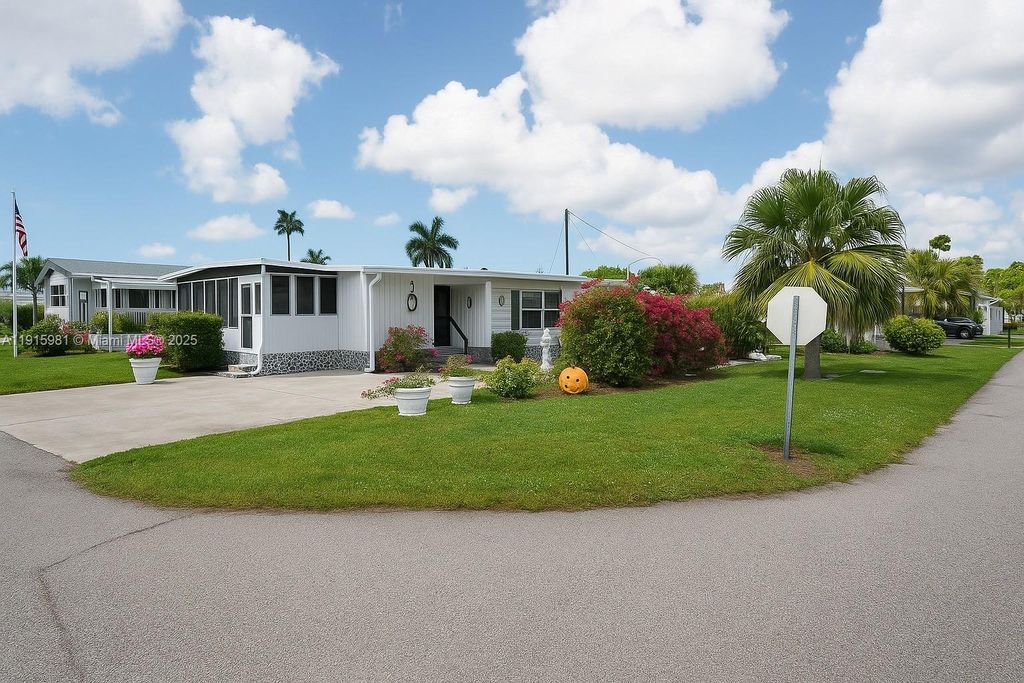 Photo of 1002 1002 sunrise Blvd, Naples, FL 34110 (MLS # A11915981)