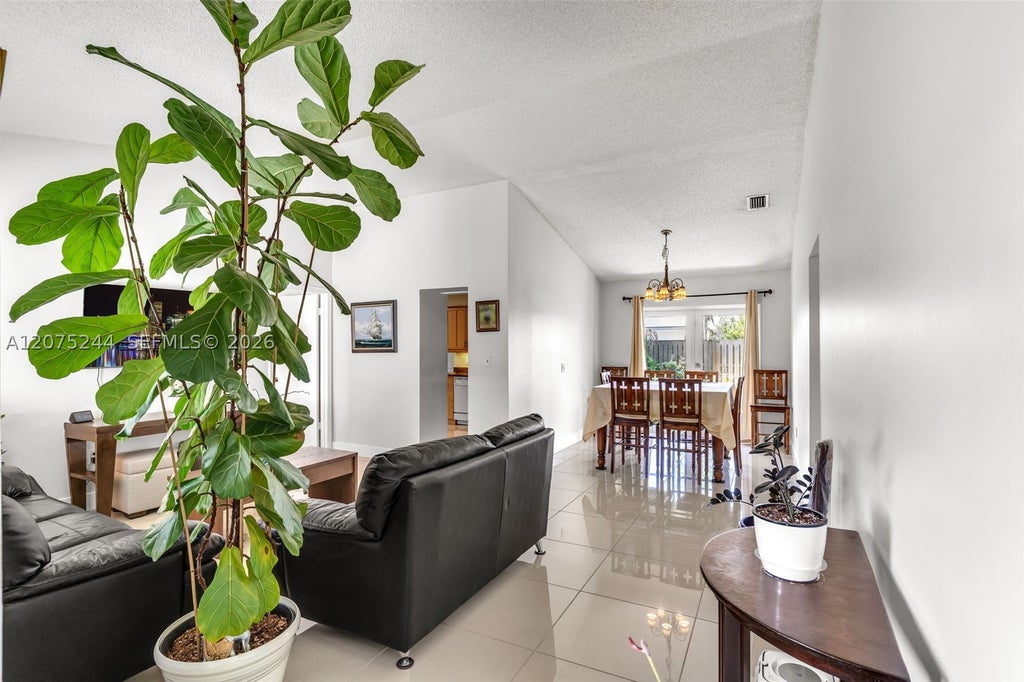 Photo of 11740 NW 39th Pl, Sunrise, FL 33323 (MLS # A12075244)