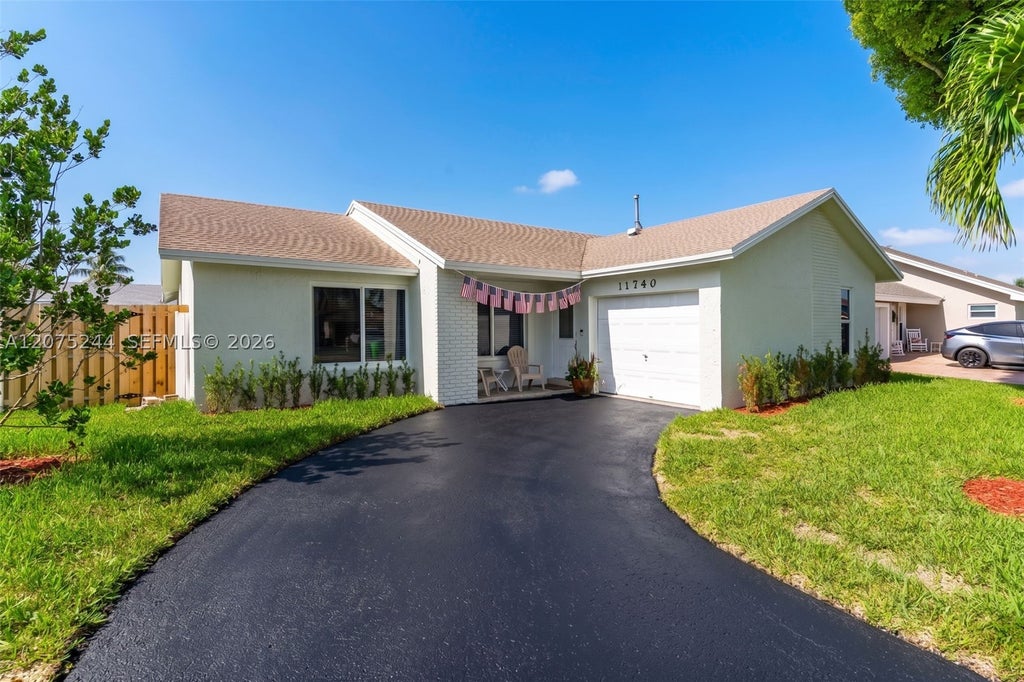 Photo of 11740 NW 39th Pl, Sunrise, FL 33323 (MLS # A12075244)