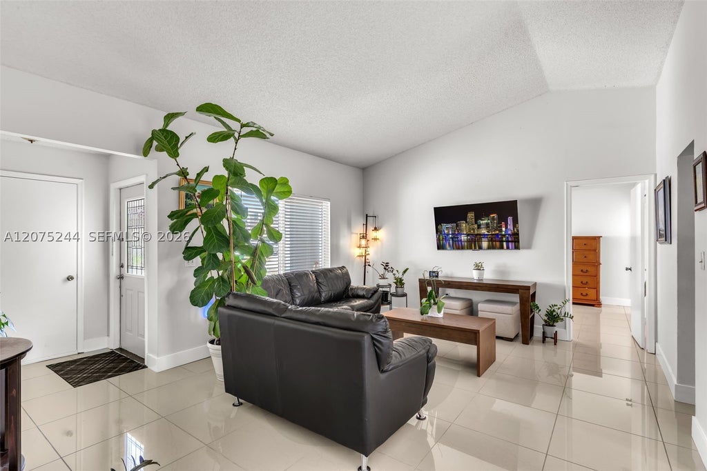 Photo of 11740 NW 39th Pl, Sunrise, FL 33323 (MLS # A12075244)