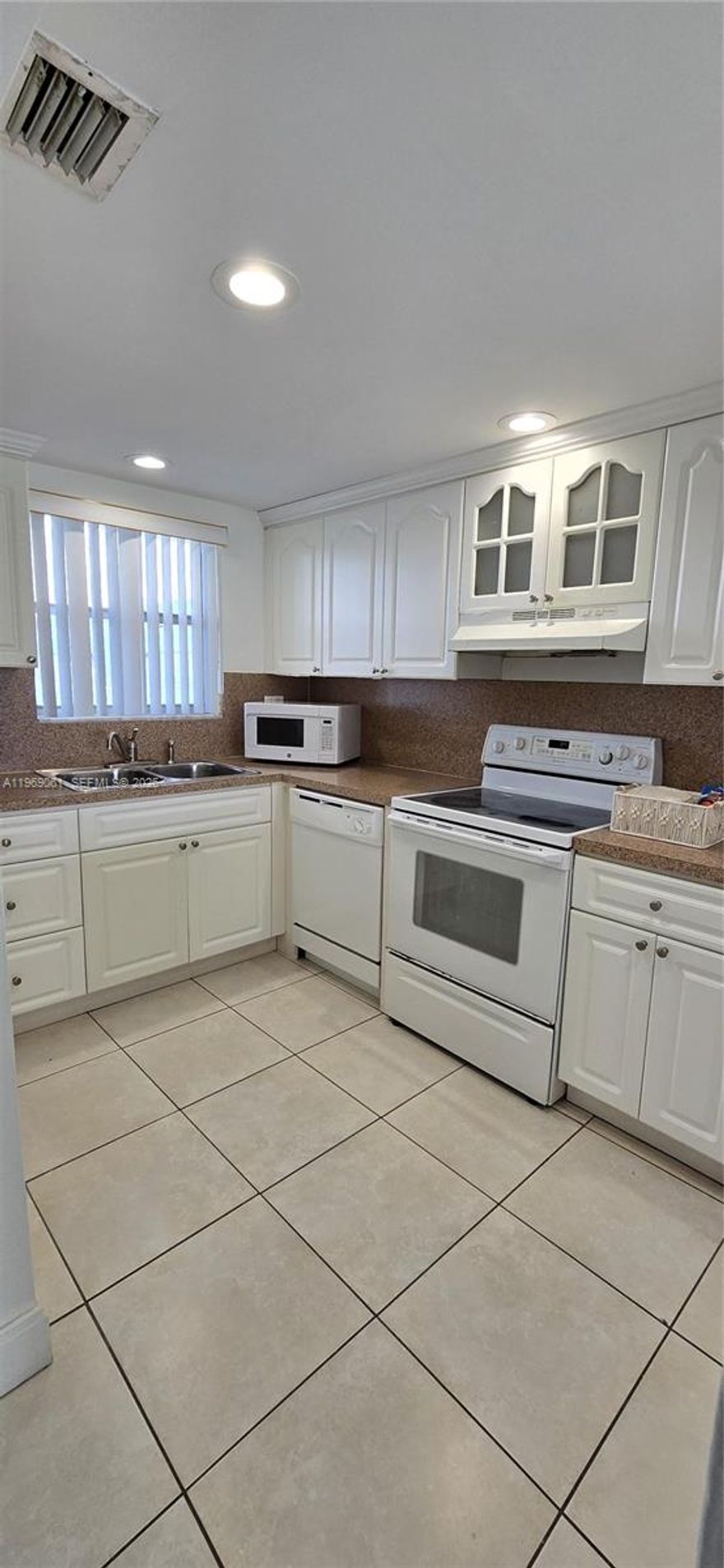 Bright and spacious 1-bedroom apartment at The Beach Condo offering spectacular water views from your private balcony. This well-maintained unit includes the convenience of an in-unit washer and dryer, plus two assigned parking spaces.