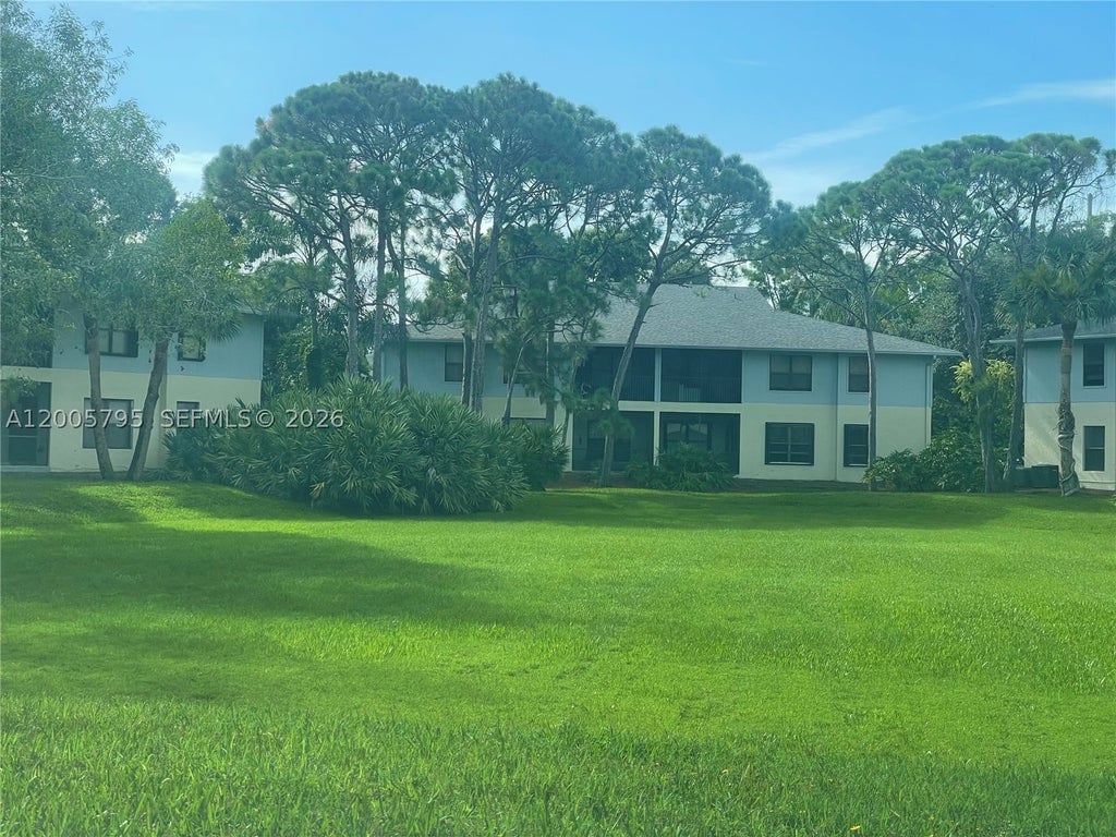 Photo of 6553 SE Federal Hwy #10-102, Stuart, FL 34997 (MLS # A12005795)