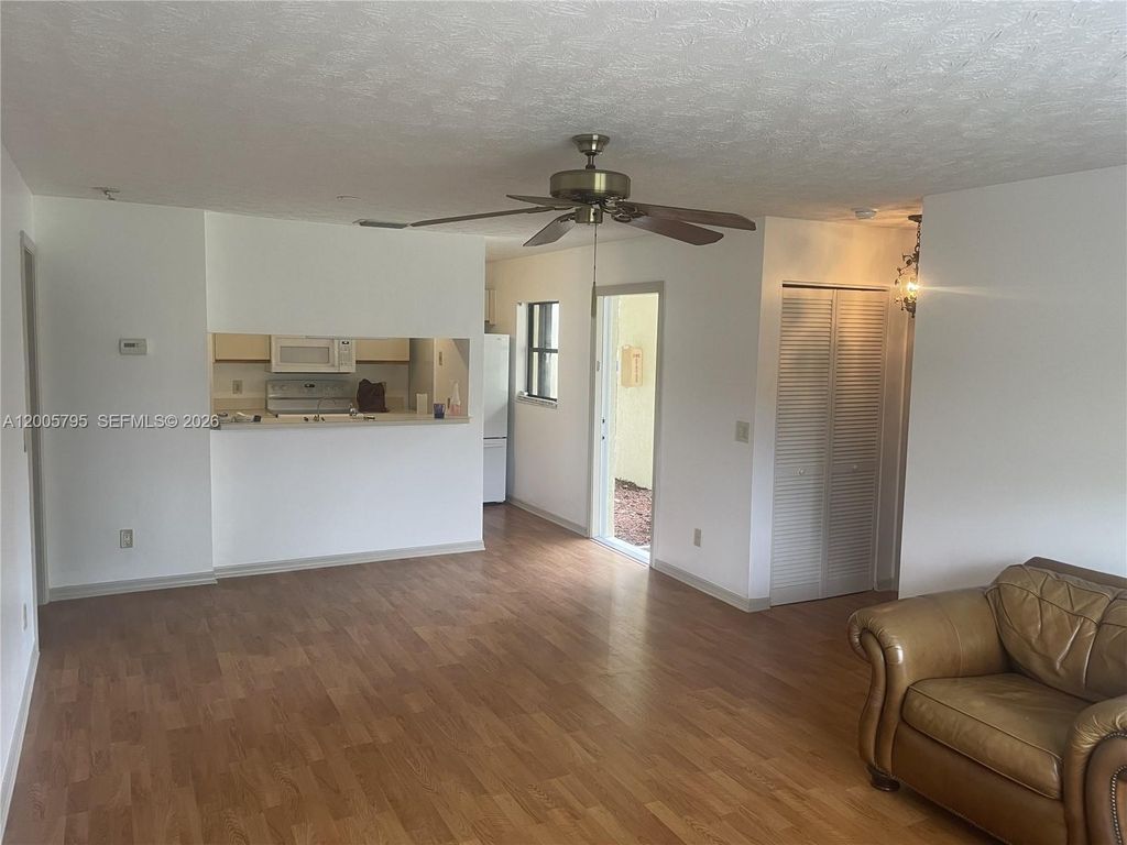 Photo of 6553 SE Federal Hwy #10-102, Stuart, FL 34997 (MLS # A12005795)