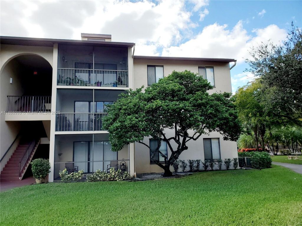 Photo of 201 Foxtail Dr #F2, Green Acres, FL 33415 (MLS # A11898999)