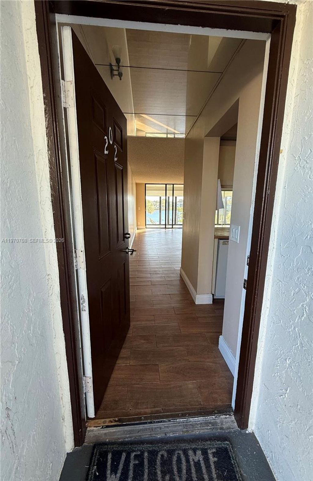 Photo of 201 Lake Pointe Dr #202, Oakland Park, FL 33309 (MLS # A11970708)