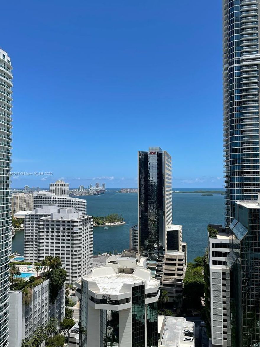 Enjoy the water views from this spacious & bright 2/3 PLUS DEN at 1010 Brickell. This is the largest 2/3 plus den floorplan at 1010. European style open kitchen, porcelanato floors, PRIVATE ELEVATOR, bedrooms with ensuite bathrooms & more. One of the only listings to include 2 PARKING SPACES. 1010 Brickell Condo offers luxury at its best: 24 hour security, fitness center, rooftop swimming pool, Hammam spa, squash court, playrooms +++. Excellent location next to entertainment, shopping, dining, US1 & I 95. Please contact listing agent for showings.