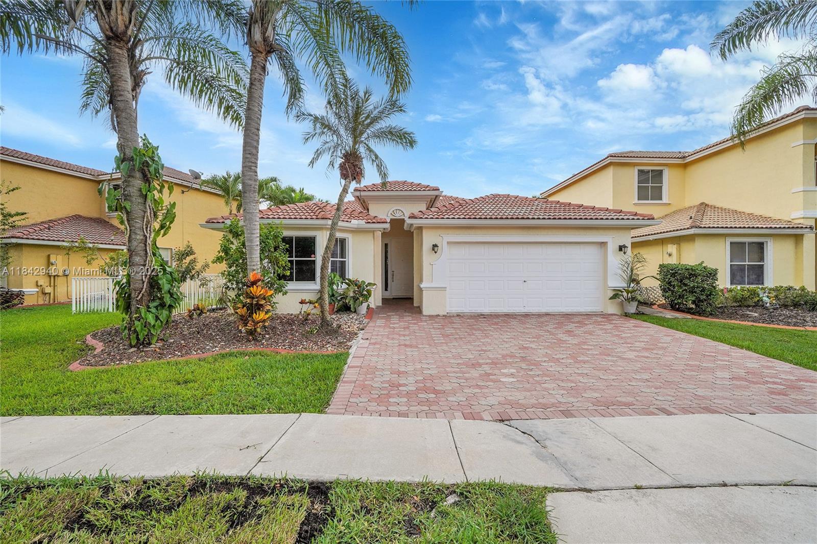 Step into this beautiful lake front one-story home in a gated desirable community of Mariposa Isle at Monarch Lakes. It offers the perfect blend of comfort, style, and tranquility. Enjoy the lake view right from your covered and screened patio — the ideal spot to relax or entertain year-round. Inside, you'll find a well-appointed kitchen with granite countertops, stainless steel appliances, wood cabinetry and plenty of storage. The tile flooring in the main living areas and laminate in the bedrooms combine beauty with easy maintenance. Crown moldings in living area add a touch of elegance. Whether you're looking for peaceful lakefront mornings or a secure and stylish space to call home, this one checks all the boxes! ? Contact me today to schedule your private showing!