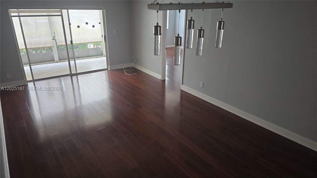 Photo of 7271 S Devon Dr #101, Tamarac, FL 33321 (MLS # A12025187)