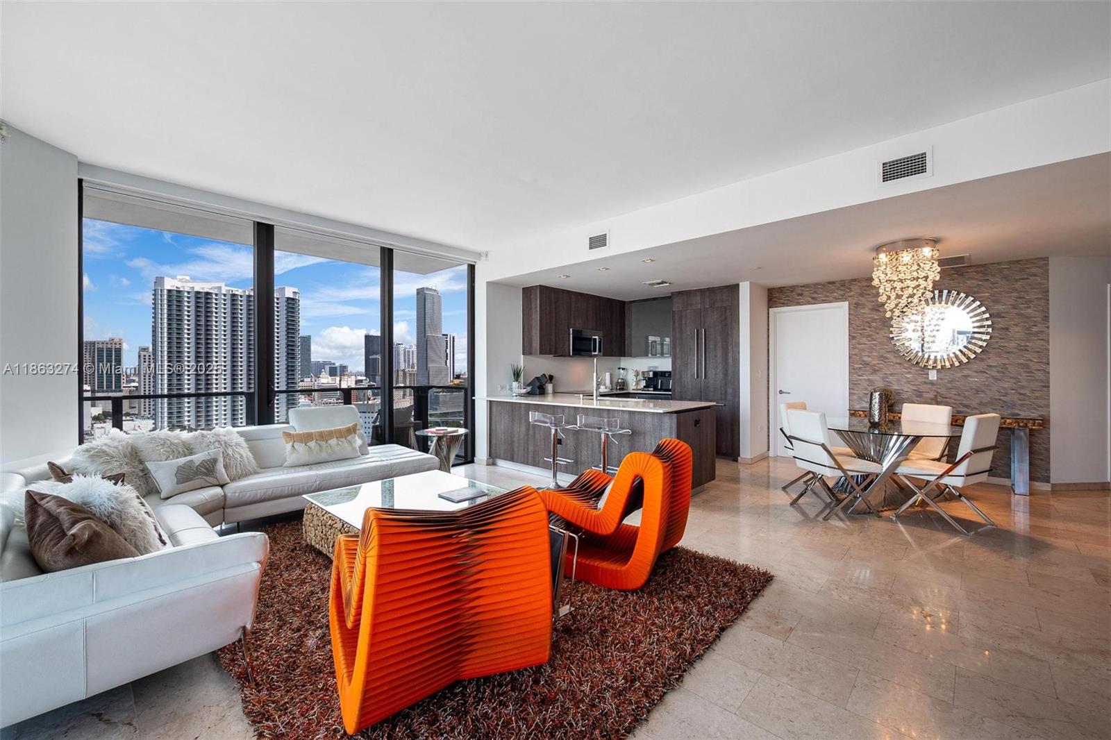 Experience the best of Miami living in this corner 3-bedroom, 3.5-bath residence at Rise Brickell City Centre. Floor-to-ceiling windows and a wraparound balcony showcase sweeping views of the Miami River and city skyline. Offered fully furnished, the home features marble flooring, an Italian kitchen with Bosch appliances, custom closets, and motorized shades throughout. Residents enjoy resort-style amenities including a pool, spa, business center, children’s playroom, and 24-hour concierge. Located in the heart of Brickell, offering exceptional walkability to world-class dining, shopping, and entertainment at Brickell City Centre, with easy access to I-95 for seamless travel throughout Miami.