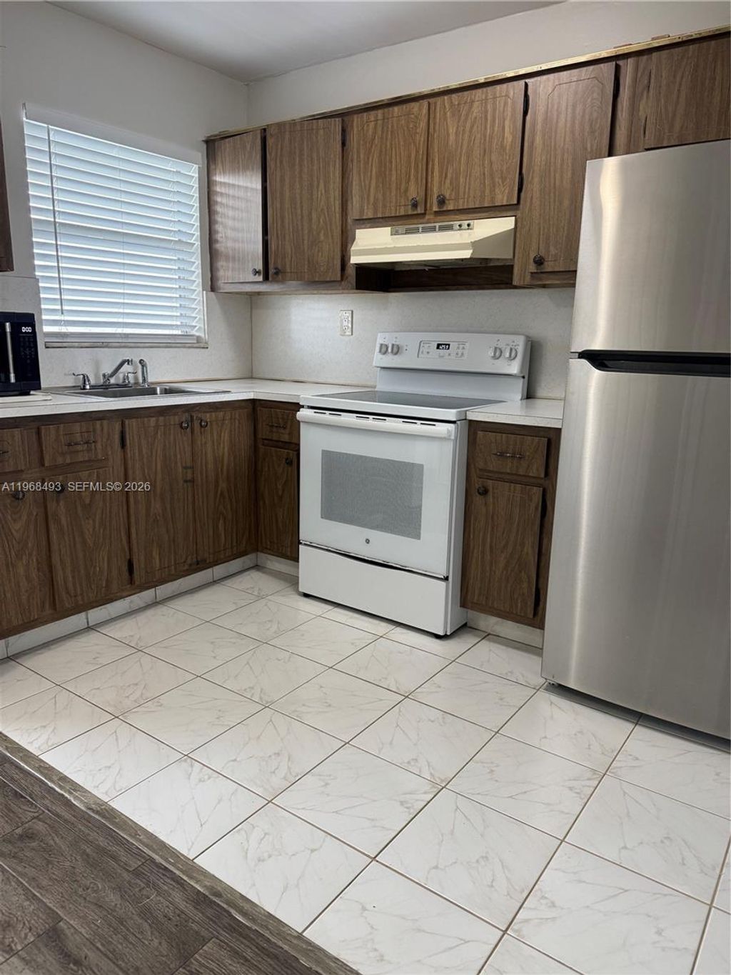 Photo of 8515 Sunrise Lakes Blvd #302, Sunrise, FL 33322 (MLS # A11968493)