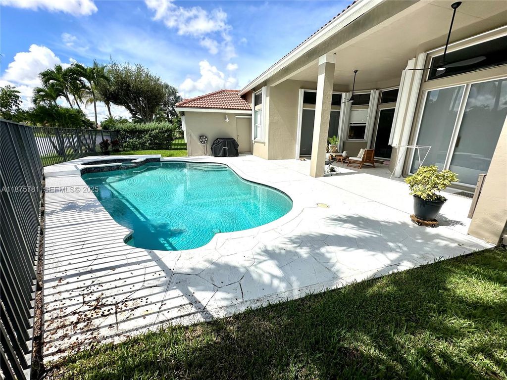 Photo of 656 Verona Pl, Weston, FL 33326 (MLS # A11875781)