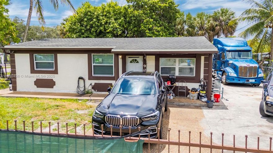 Beautifully renovated 3BD/2BA home on a large gated corner lot with a brand-new roof, impact windows, newer A/C, & stylish updates throughout. The modern kitchen & bathrooms feature upgraded finishes, & the home includes a detached storage building plus an in-law suite with potential for rental income. The spacious yard offers plenty of room for a boat, RV, or work vehicles, & is surrounded by mature fruit trees. Fully fenced for privacy & security. Walking distance to St. George Park & a large flea market. Minutes to I-95, Turnpike, downtown Fort Lauderdale, Las Olas, beaches, & just 15 minutes to the airport. A perfect blend of comfort, location, & opportunity—move-in ready or ideal for investment! Currently rented, generating rental income: one unit at $2,400/mo, the other at $1,600/mo.