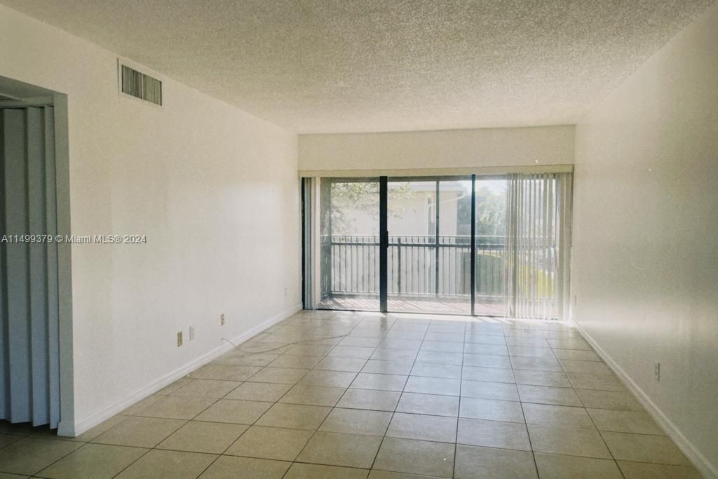 Photo of 5981 Washington St #207, Hollywood, FL 33023 (MLS # A11499379)