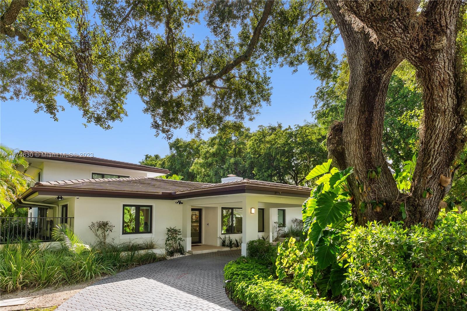 Are you searching for the perfect family home in a prime location? Look no further! This exquisite house in the heart of Coral Gables is a dream come true. Exceptional features and ideal surroundings, from the moment you step inside you will be captivated by its elegance.
High end finishes throughout out the house can be seen on elegant presence of marble accents, on cabinets adorned with exquisite LED lighting and the captivating skylight feature which brings the outdoors inside.
Refined separate dining space is designed to cater your culinary and entertainment desires, as kitchens is equipped with top of the line appliances and gas stove.
Backyard and pool make this house perfect for families and unforgettable gatherings.
Actual square footage as per tax roll: 4,701 sqft.