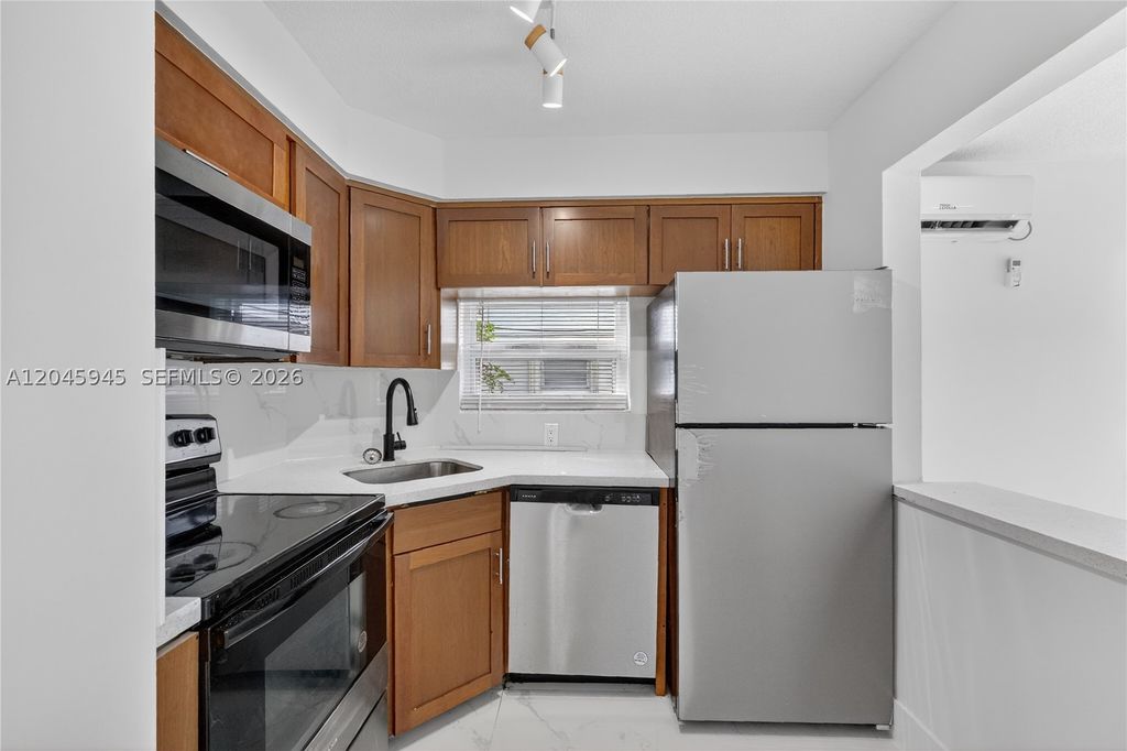 Photo of 1520 NE 56th St #8, Fort Lauderdale, FL 33334 (MLS # A12045945)