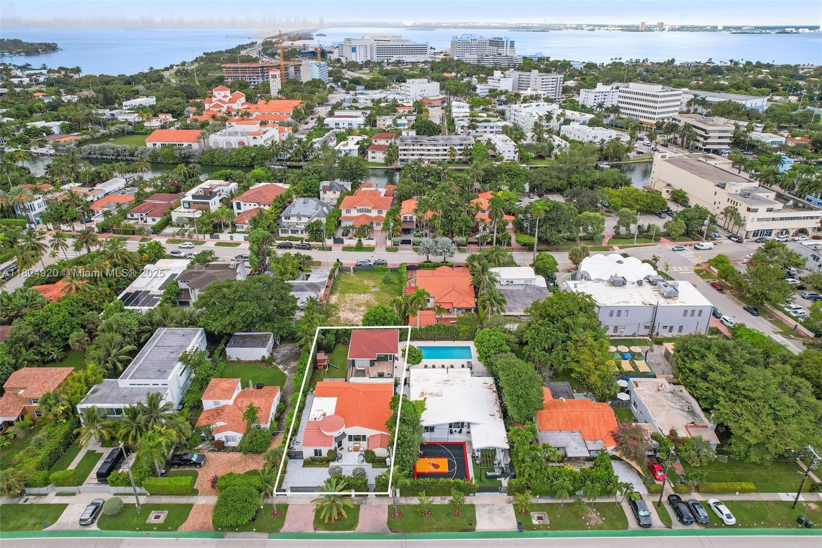 Experience over 4,429 square feet of refined and luxurious living in this recently renovated prime Miami Beach residence. This stunning home boasts 6 bedrooms, each with its own en suite bathroom, 6.5 bathrooms in total, an office, and a study, providing flexible space for both daily life and entertaining. The spacious layout is highlighted by high ceilings and includes a generously sized living room and dining area. The heart of the home features a modern kitchen with elegant quartz countertops and an open kitchen concept. The master bedroom, situated alone on the second floor, offers unparalleled privacy. Outdoor features include a playground area with room for a pool and a rooftop terrace, complete with a hot tub and lounge area. A+ location moments from the beach, dining, and shopping.