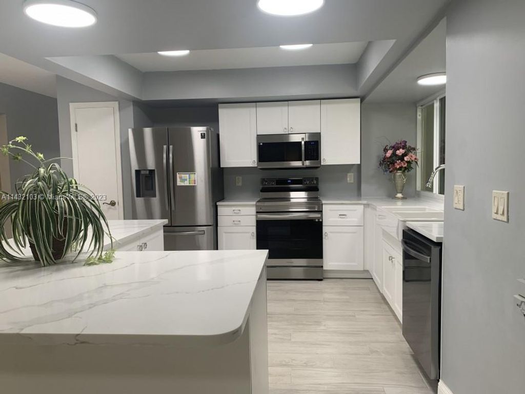 Photo of 520 NW 46th Ave, Plantation, FL 33317 (MLS # A11432103)