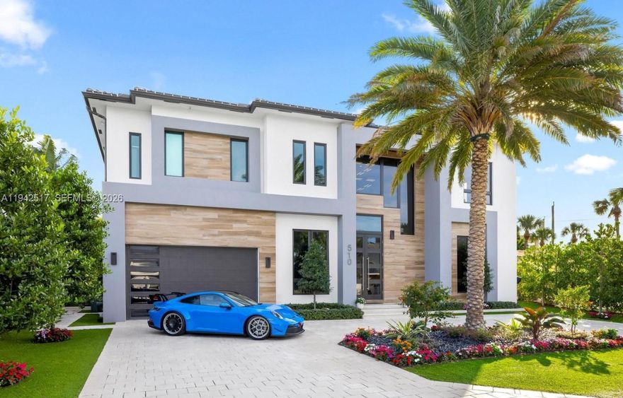 Ideally located on a quiet cul-de-sac in one of Boca Raton’s most sought-after neighborhoods, this contemporary residence built in 2022 offers 4,813 square feet of refined living space with 6 bedrooms and 6.5 bathrooms—perfectly designed for everyday comfort and elevated entertaining.

Just minutes from the beach, Mizner Park’s premier dining and shopping, and the iconic Boca Raton Resort, this home delivers the best of the coastal lifestyle with exceptional convenience.

The open-concept interior features sleek architectural lines, designer finishes, and abundant natural light throughout. A private elevator provides effortless access to all levels, while the chef-inspired kitchen anchors the heart of the home—ideal for hosting and gathering.

Step outside to a private outdoor retreat with a resort-style pool and spacious yard—offering a rare blend of privacy and space in East Boca. Additional highlights include spa-like bathrooms, a powder room, dual washer and dryer setups, central air, and a garage.

A rare opportunity to own a newer modern luxury home in a premier cul-de-sac location.