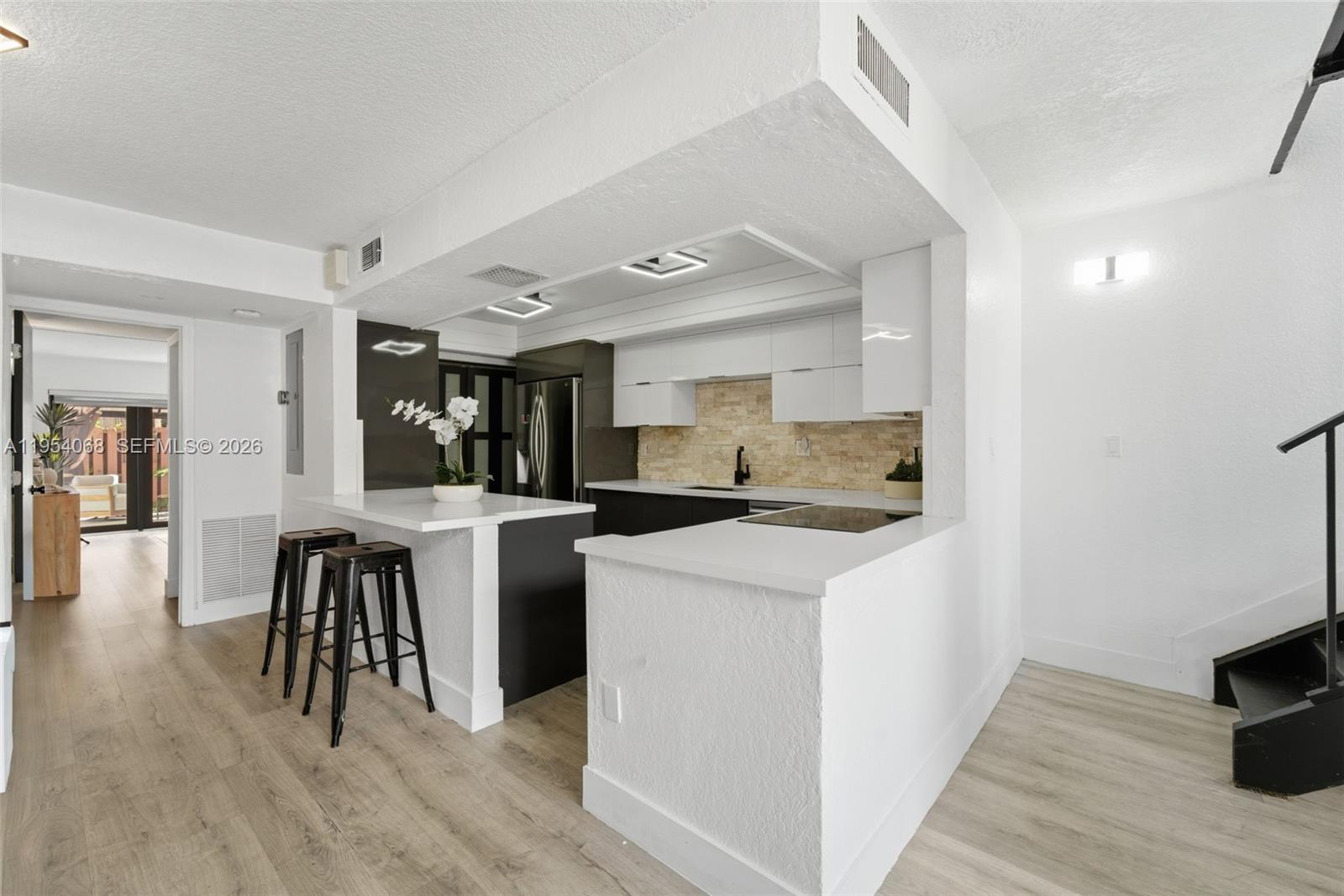 SUNSET KENDALL VILLAS - Residential