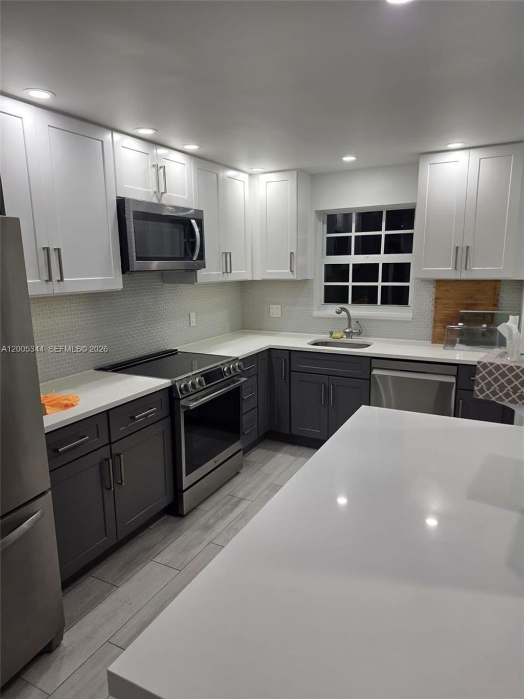 Photo of 660 Tennis Club Dr #201, Fort Lauderdale, FL 33311 (MLS # A12005344)