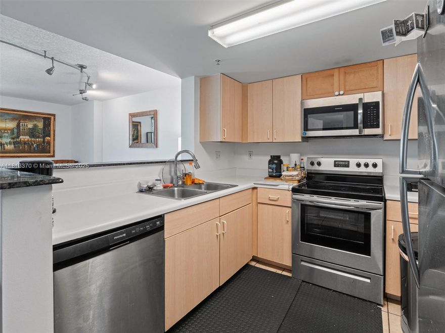 Gorgeous 1/1 condo with great views of Coral Gables and Miami Skyline in the prestigious The Aston Condominium. Maple wood floors in living, dining & bedroom, open kitchen with new stainless appliances & granite breakfast bar, very spacious bedroom with oversized walk-in closet, washer & dryer inside unit, high impact windows, 1 assigned covered parking space #415.  Water, internet & pest control included in maintenance fees. Enjoy renovated pool & gym, 24-hr security & concierge, lots of visitor's parking, manager on site in this well-located building next to Coral Gables, shopping, restaurants & public transportation.