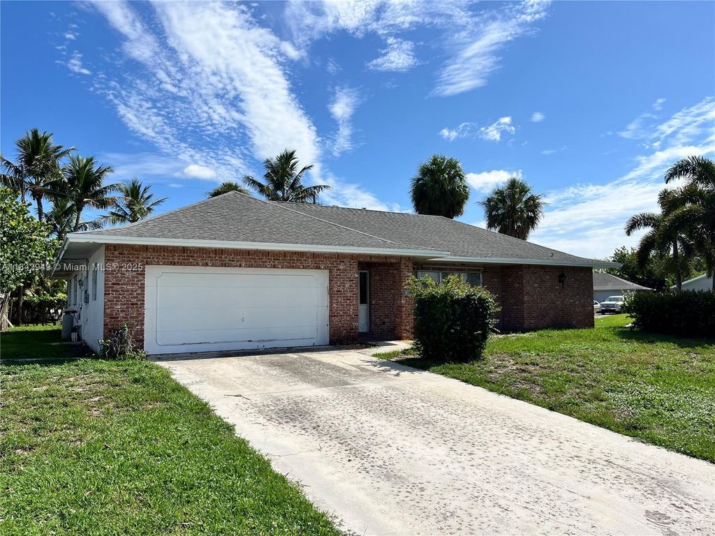 Photo of 3555 Cosmos St, Palm Beach Gardens, FL 33410 (MLS # A11842949)