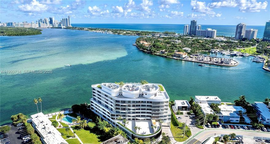 Step into quiet, effortless luxury at ONDA, Bay Harbor Islands’ most exclusive boutique building with just 41 residences and an atmosphere of refined elegance and high-level privacy. This gorgeous designer-finished 2-bedroom+ enclosed DEN, 3 bath home offers approx. 2,177 SF of interior space + a 400 SF terrace, where your private elevator opens to a foyer leading to a large living room with stunning, unobstructed bay views. The open-concept split floor plan, fully furnished in chic contemporary style by BoConcept, is ideal for both elegant entertaining and serene everyday living. A gourmet Snaidero kitchen with marble countertops and top-of-the-line Miele appliances anchors the home, while motorized  privacy/blackout shades & integrated lighting enhance the “quiet luxury” ambiance. Spa-inspired bathrooms wrapped in Statuarietto marble create a calm, hotel-quality retreat in each suite. A large, deep terrace is perfect for lounging or dining while taking in the breathtaking turquoise-colored open bay. ONDA’s boutique scale ensures a discreet, ultra-luxury lifestyle with a panoramic rooftop pool and hot tub, wellness with spa, steam, sauna, treatment room and yoga studio, Technogym fitness center, private marina, EV charging, two garage spaces, 24-hour valet and 5-star concierge. Minutes to Bal Harbour Shops, St. Regis, beaches, A+ schools, houses of worship, Design District, fine dining, arts and culture—this is a rare opportunity to own a highly private bayfront sanctuary.